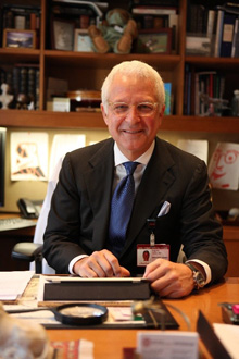 Dr. Philip Stieg sitting at a desk