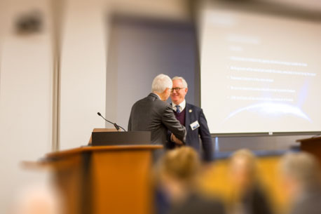 Dr. Eric Elowitz &amp; Dr. Walter Johnson shake hands