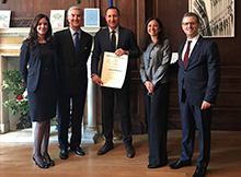 Dr. Antonio Bernardo, center, being presented with the Order of Merit by the Honorable Francesco Genuardi, Consul General of Italy in New York, and by Deputy Consuls General Roberto Frangione, Isabella Periotto, and Chiara Saulle.