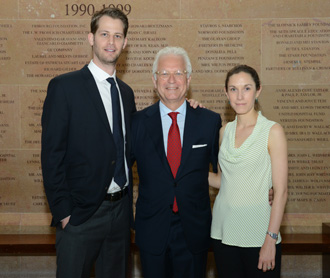 Dr. Philip E. Stieg (center), chairman of the Department of Neurosurgery, with graduates Dr. David Rubin and Dr. Caitlin Hoffman