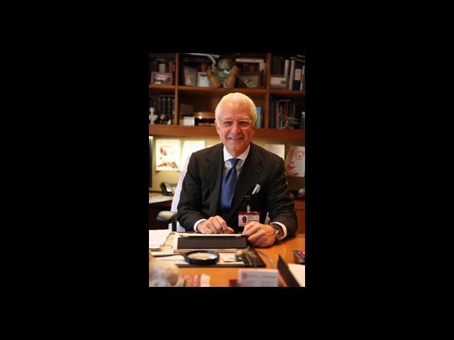 Dr. Philip Stieg sitting at a desk