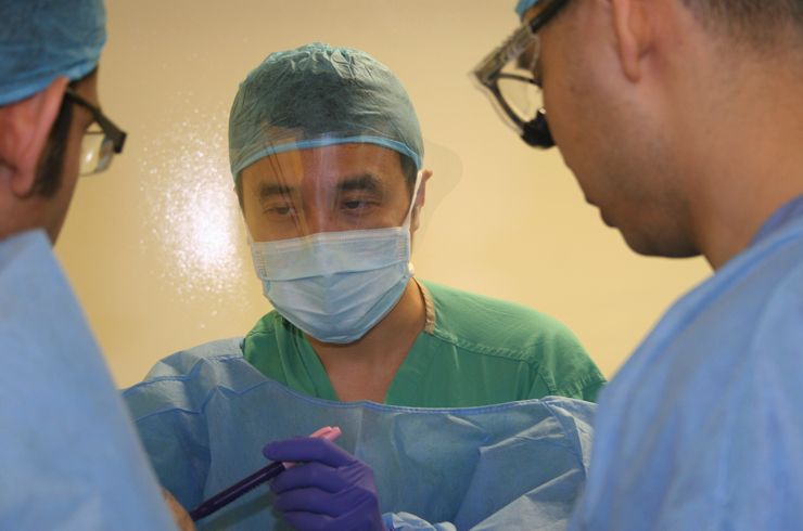Dr. Ning Lin guides residents at a cranial station