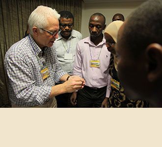 Dr. Stieg provides close-up details to eager students
