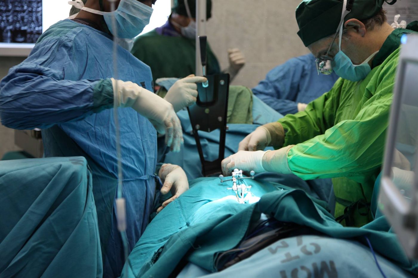 Dr. Hartl trains the local team on a laminectomy, Tanzania 2014