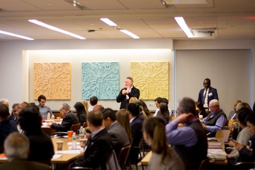 Attendees ask questions to speakers to learn more