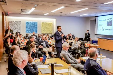 Attendees ask questions to speakers to learn more