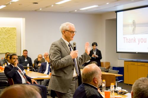 Attendees ask questions to speakers to learn more