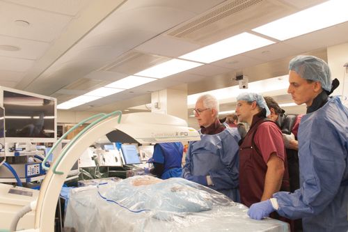 Dr. Eric Elowitz demonstrates techniques for spinal surgery