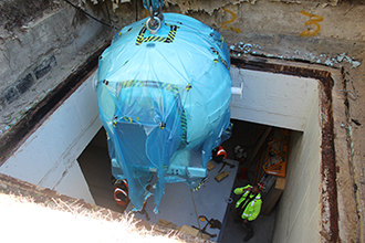 An access hatch, unused for nearly 30 years, was opened to allow the machine to be (gently) lowered into the subbasement. It was then maneuvered to its final destination in the Stitch Radiation Oncology Center.
